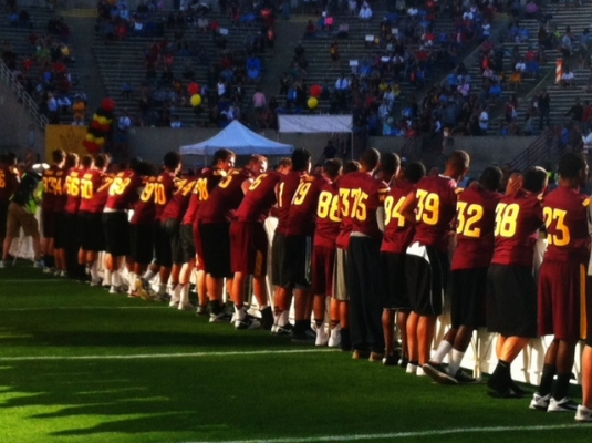 Sun Devil football players greeted runners at the finish line.