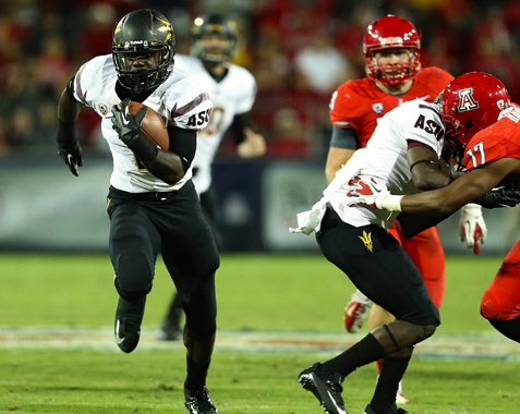 2012 - Sun Devil Marion Grice breaks away from the pack in Tucson (photo, ASU)