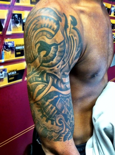 The "machine" design on Michael Eubank's right throwing arm.