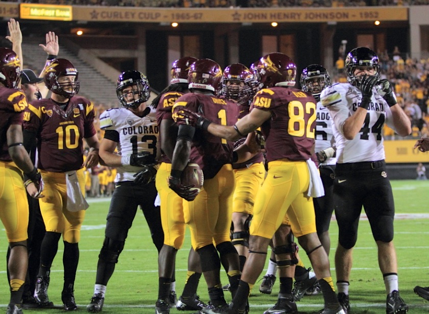 Marion Grice scores one of his 2 touchdowns against Colorado