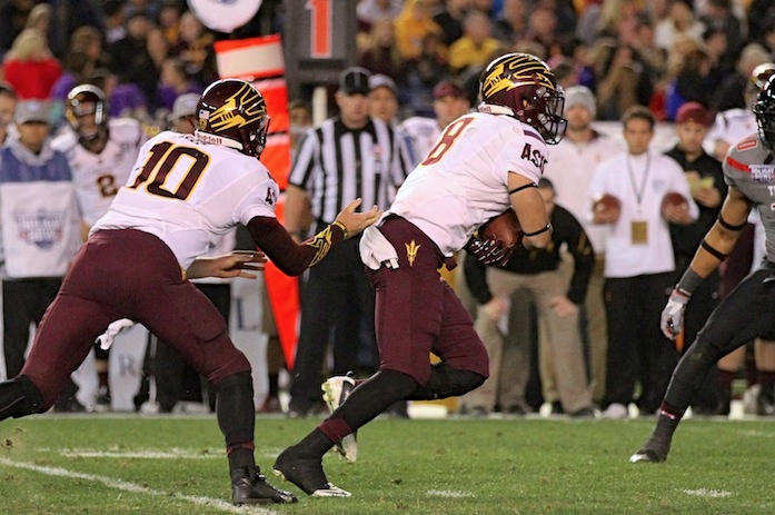 Taylor Kelly hands off to D.J. Foster in the Holiday Bowl (photo- Steve Kelly for DieHardDevil.com)