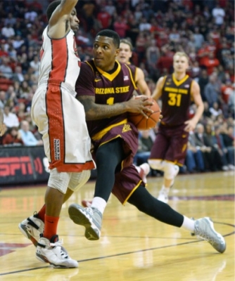 Jahii Carson in a “Cool Grey” Jordan IX  (photo credit, Zimbio.com)